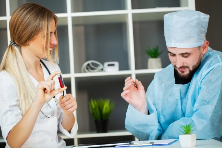 Doctor takes a patient in hospital office